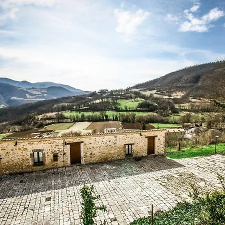 Le Aie Di Postignano شقة